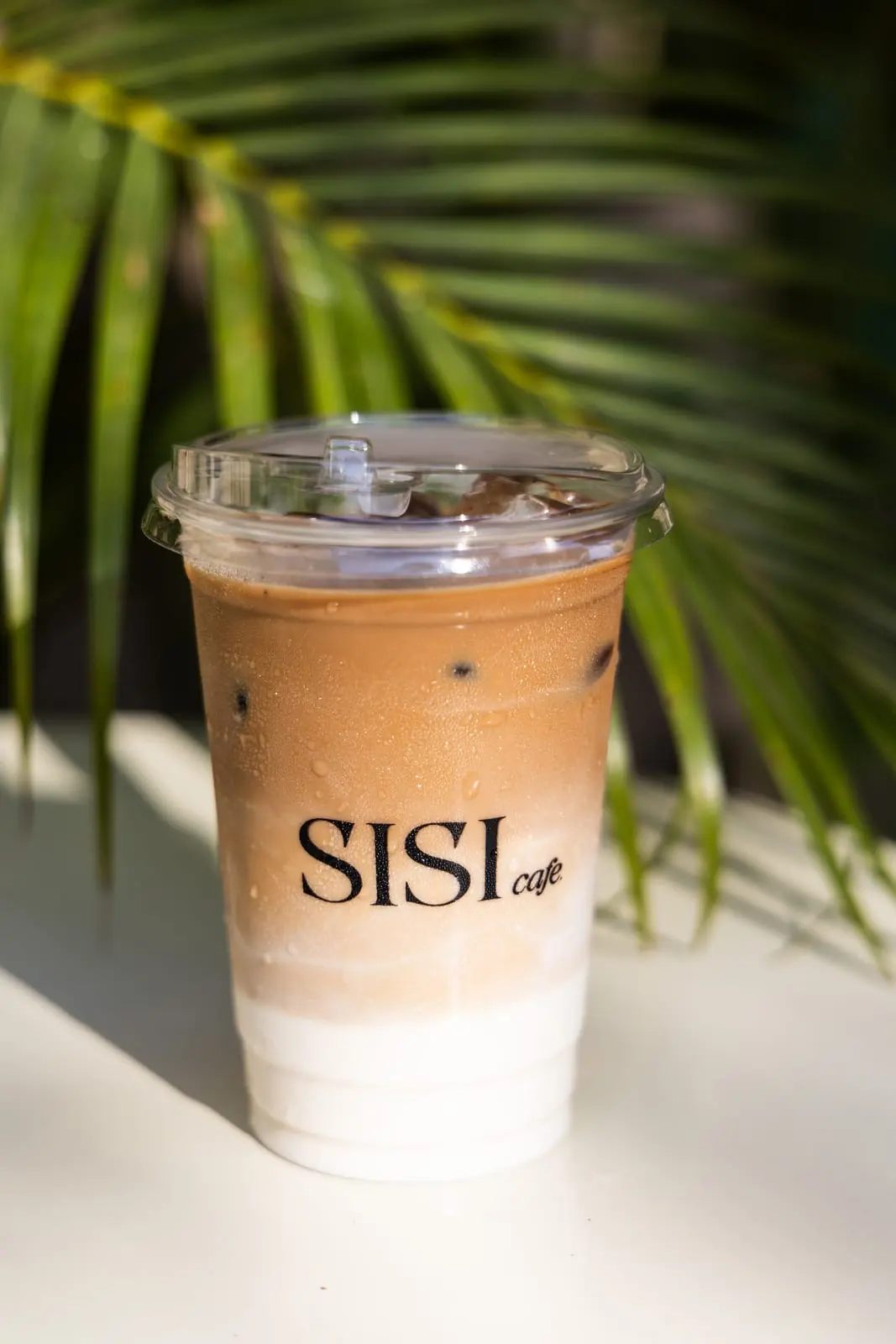 Layered iced cacao latte